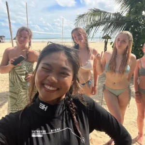 Local Thai group tour guide on a beach